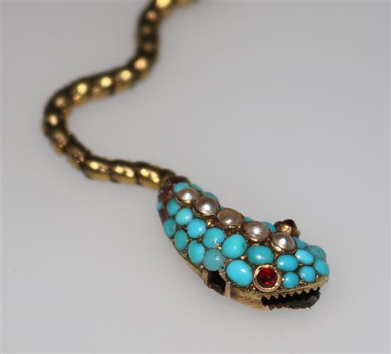 A late Victorian gold and gem set serpent bracelet.